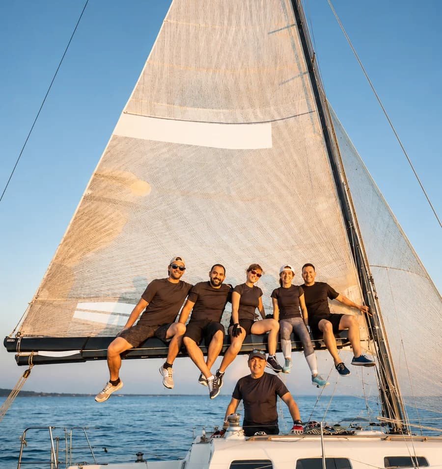A family team moving forward together under sail